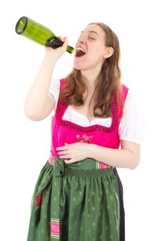 Young woman in dirndl drinking some bottles of wine
