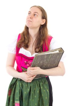Young woman in dirndl thinking about her success in business