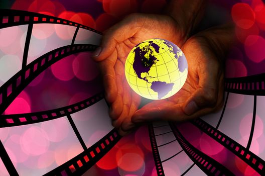 World movie concept, Hand hold the earth with movie film background