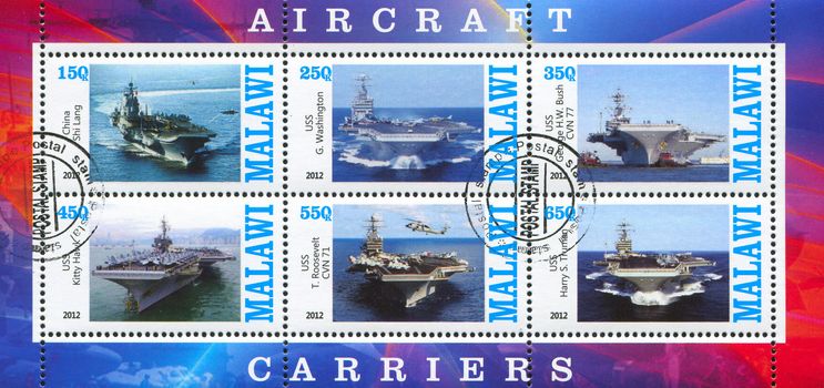 MALAWI - CIRCA 2012: stamp printed by Malawi, shows aircraft carrier, circa 2012