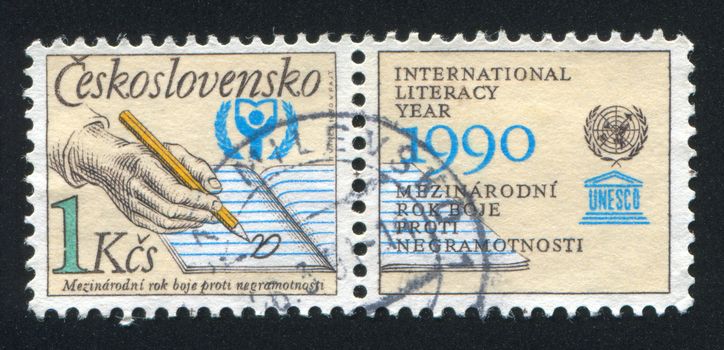 CZECHOSLOVAKIA - CIRCA 1990: stamp printed by Czechoslovakia, shows UNESCO World Literacy Year, circa 1990