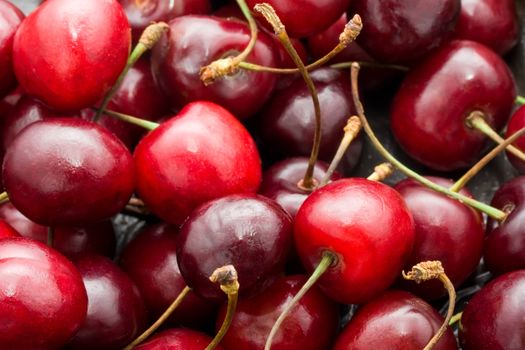 Beautiful red fresh cherry macro photo background