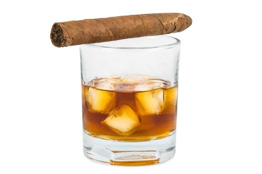 Glass of whiskey with ice and cigar isolated on white background with clipping path