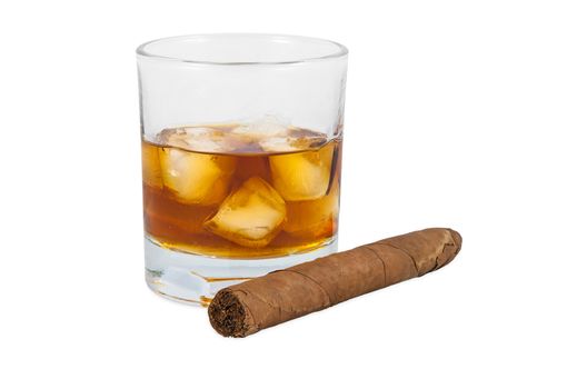 Glass of whiskey with ice and cigar isolated on white background with clipping path