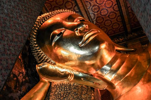 Buddha gold statue . Wat Pho, Bangkok, Thailand Asia