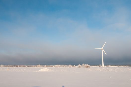 Winter shot of windmill and blue sky