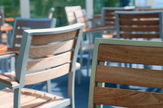 Wooden seats and tables on the ship