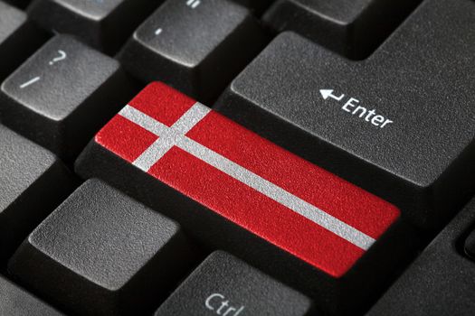 The Danish flag button on the keyboard. close-up