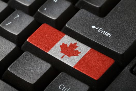 The Canadian flag button on the keyboard. close-up