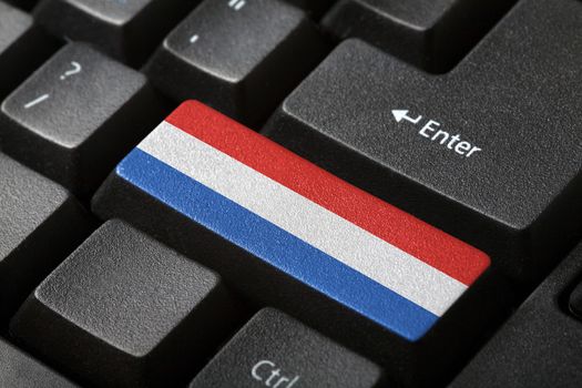 The Netherlands flag button on the keyboard. close-up