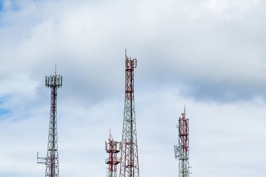 Communication tower over a blue sky background