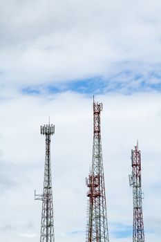 Communication tower over a blue sky background