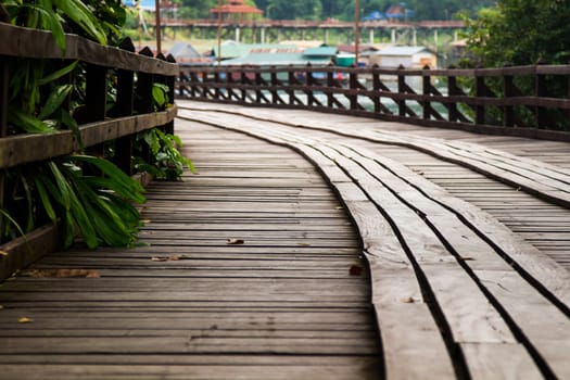 The old wooden bridge across the river