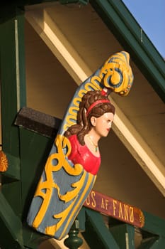 Decorative wooden boat 
bow on a house  on Island of Fanoe in Denmark