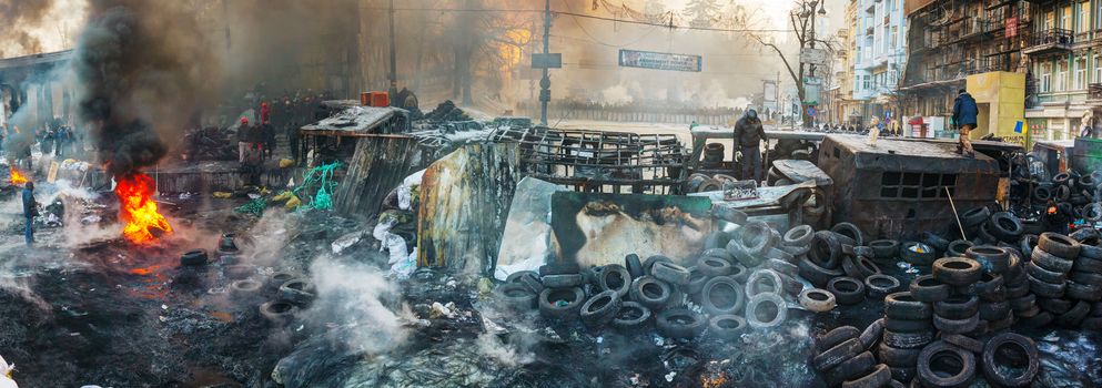 KIEV, UKRAINE - JANUARY 24: Overview of the barricade at Hrushevskogo street on January 24, 2014 in Kiev, Ukraine. The anti-governmental protests were provoked when the Ukrainian president denied to sign an agreement with the EU.