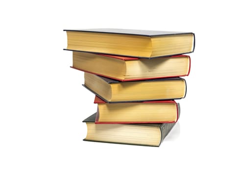 stack of closed old used brown books