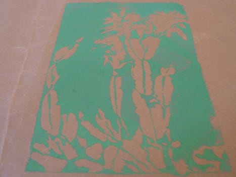 Batik floral print in green on pale brown