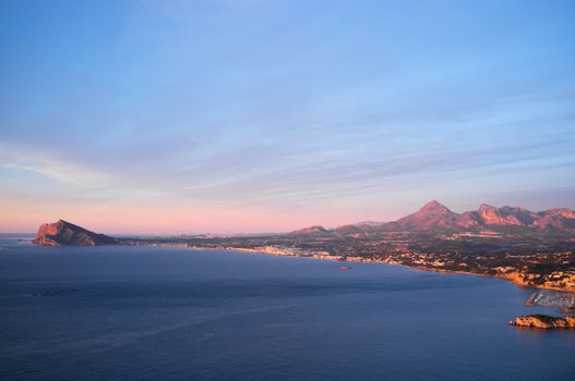 Altea bay with Benidorm resort in the background, Costa Blanca, Spain