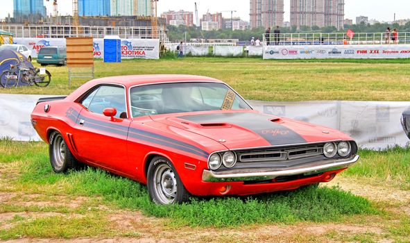 MOSCOW, RUSSIA - JULY 6: American muscle car Dodge Challenger exhibited at the annual International Motor show Autoexotica on July 6, 2012 in Moscow, Russia.