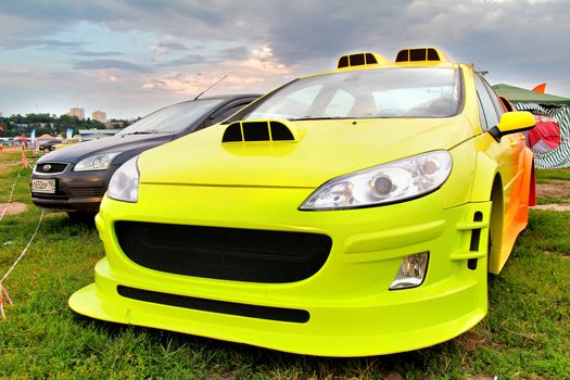 MOSCOW, RUSSIA - JULY 6: Tuned french motor car Peugeot 407 exhibited at the annual International Motor show Autoexotica on July 6, 2012 in Moscow, Russia.