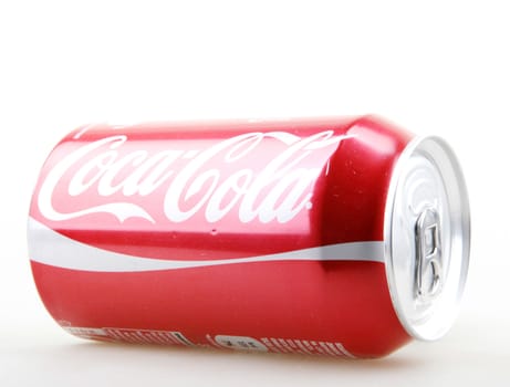 AYTOS, BULGARIA - JANUARY 25, 2014: Coca-Cola bottle can isolated on white background. Coca-Cola is a carbonated soft drink sold in stores, restaurants, and vending machines throughout the world.