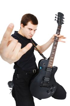 Man in black clothes with an electric guitar