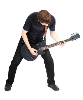 Man in black clothes with an electric guitar