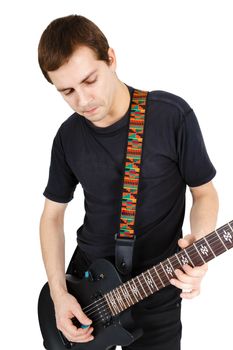 Man in black clothes with an electric guitar