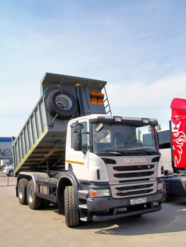 UFA, RUSSIA - MAY 14: Scania P380 dump truck on display at the annual Motor show "Autosalon" on May 14, 2012 in Ufa, Bashkortostan, Russia.