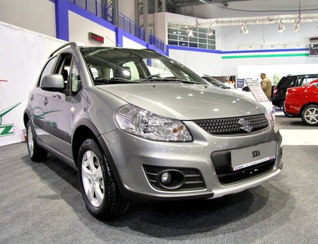 UFA, RUSSIA - MAY 14: Japanese motor car Suzuki SX4 on display at the annual Motor show "Autosalon" on May 14, 2012 in Ufa, Bashkortostan, Russia.