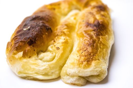 Delicious looking breakfast. Baked pastry with cheese.