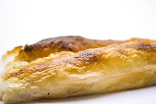 Delicious looking breakfast. Baked pastry with cheese.