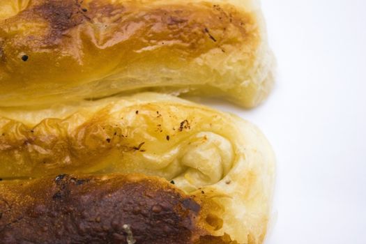 Delicious looking breakfast. Baked pastry with cheese.