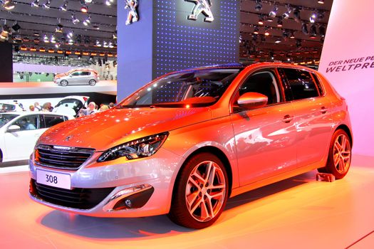 FRANKFURT AM MAIN, GERMANY - SEPTEMBER 14: French motor car Peugeot 308 exhibited at the annual IAA (Internationale Automobil Ausstellung) on September 14, 2013 in Frankfurt am Main, Germany.