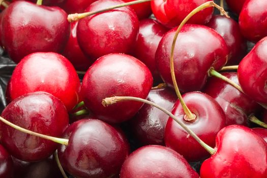 Beautiful red fresh cherry macro photo background