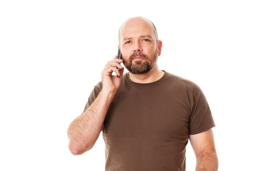 An image of a handsome bearded man at the phone