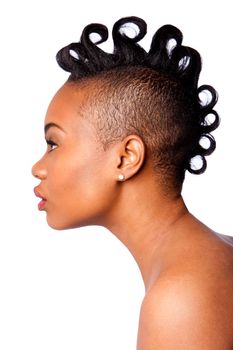 Side profile of beautiful African woman face with curls Mohawk hairstyle, isolated.