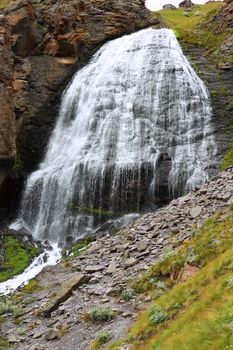 Waterfall Girlish Braids between the mountains of Northern Caucas