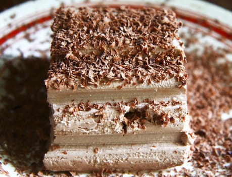 Chocolate ice cream and hardered chocolate over