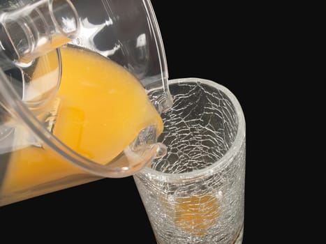 orange juice squeezed with juicer and glass