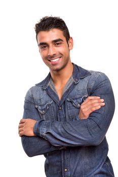 Casual young man with arms crossed and smiling