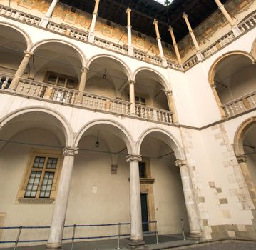 KRAKOW, POLAND - AUGUST 24: inner yard of royal palace in Wawel on August 18, 2013 in Krakow, Poland. The monument to the history of the Decree of the President Lech Walesa on September 8, 1994.