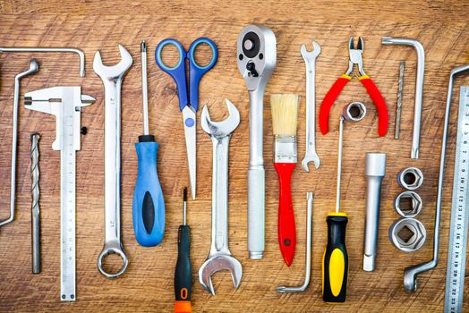 set of tools on a wooden background