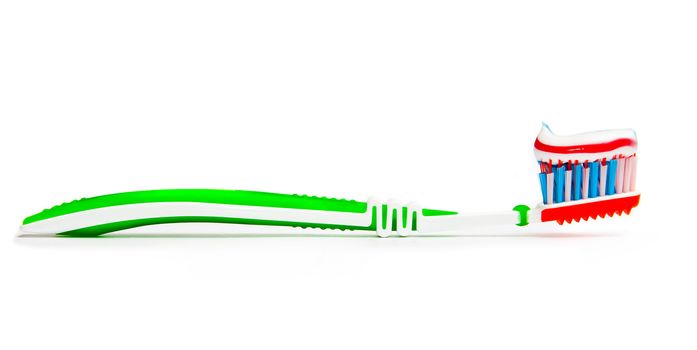 toothbrush with toothpaste isolated on a white background