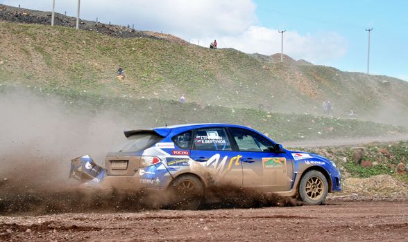 BAKAL, RUSSIA - AUGUST 8: Evgeny Vertunov's Subaru Impreza WRX (No. 1) competes at the annual Rally Southern Ural on August 8, 2008 in Bakal, Satka district, Chelyabinsk region, Russia.