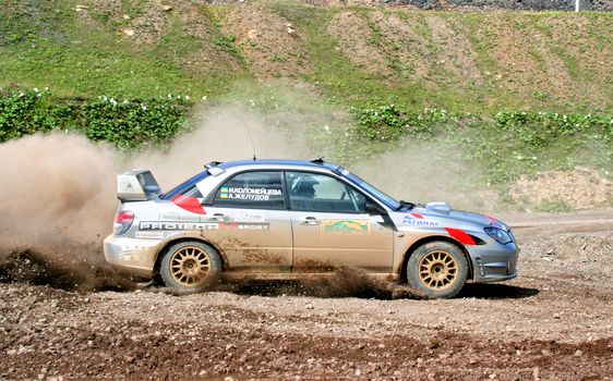 BAKAL, RUSSIA - AUGUST 8: Alexander Zheludov's Subaru Impreza WRX (No. 2) competes at the annual Rally Southern Ural on August 8, 2008 in Bakal, Satka district, Chelyabinsk region, Russia.