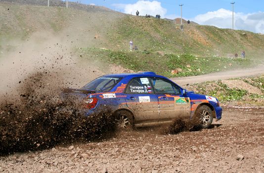 BAKAL, RUSSIA - AUGUST 8: Dmitry Tagirov's Subaru Impreza WRX (No. 9) competes at the annual Rally Southern Ural on August 8, 2008 in Bakal, Satka district, Chelyabinsk region, Russia.