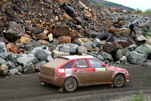 BAKAL, RUSSIA - AUGUST 8: Sergey Bakulin's LADA 2110 (No. 17) competes at the annual Rally Southern Ural on August 8, 2009 in Bakal, Satka district, Chelyabinsk region, Russia.