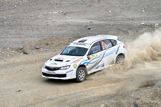 BAKAL, RUSSIA - JULY 21: Vladimir Kilunin's Subaru Impreza (No. 3) competes at the annual Rally Southern Ural on July 21, 2012 in Bakal, Satka district, Chelyabinsk region, Russia.