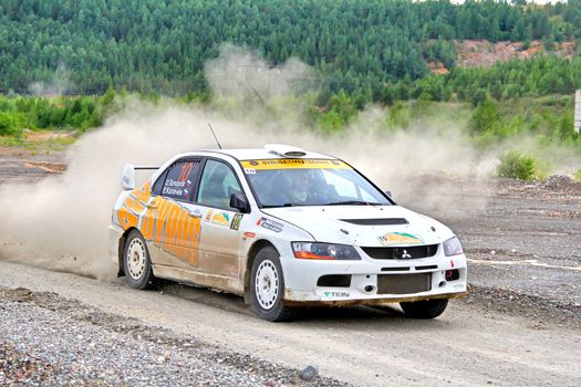 BAKAL, RUSSIA - JULY 21: Oleg Toporov's Mitsubishi Lancer Evo IX (No. 10) competes at the annual Rally Southern Ural on July 21, 2012 in Bakal, Satka district, Chelyabinsk region, Russia.